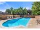Inviting outdoor pool surrounded by lounge chairs and lush landscaping, perfect for relaxation at 1350 Josephine St # 502, Denver, CO 80206
