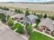 Aerial view of house and neighborhood with open space at 16911 Buffalo Valley Path, Monument, CO 80132