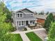 Two-story house with a gray exterior and front yard at 16911 Buffalo Valley Path, Monument, CO 80132