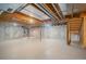 Unfinished basement with high ceilings and ample storage space at 16911 Buffalo Valley Path, Monument, CO 80132