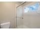 Bathroom with shower and window at 16911 Buffalo Valley Path, Monument, CO 80132