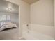 Bathroom with bathtub and view of bedroom at 16911 Buffalo Valley Path, Monument, CO 80132