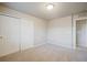 Bright bedroom with double door closet and neutral carpeting at 16911 Buffalo Valley Path, Monument, CO 80132