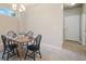 Charming dining room with wood table and four chairs at 16911 Buffalo Valley Path, Monument, CO 80132