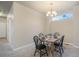Spacious dining area with a wooden table, and carpeting at 16911 Buffalo Valley Path, Monument, CO 80132