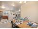 Open concept dining room, adjacent to the kitchen and living room at 16911 Buffalo Valley Path, Monument, CO 80132