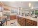 Modern kitchen with island and stainless steel appliances at 16911 Buffalo Valley Path, Monument, CO 80132