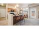 Modern kitchen with island, stainless steel appliances, and ample cabinetry at 16911 Buffalo Valley Path, Monument, CO 80132
