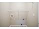 Laundry room with shelving and hook at 16911 Buffalo Valley Path, Monument, CO 80132