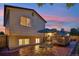 Home with patio and lush landscaping is an outdoor oasis; perfect for relaxation or entertaining at 18601 E Louisiana Ave, Aurora, CO 80017