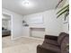 Bonus room with carpeted floors, neutral walls, and access to another room at 18601 E Louisiana Ave, Aurora, CO 80017
