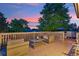 Enjoy the evening relaxing on the deck with comfortable seating and serene backyard view at 18601 E Louisiana Ave, Aurora, CO 80017