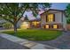 A well-maintained two-story home with lovely landscaping and inviting curb appeal at 18601 E Louisiana Ave, Aurora, CO 80017