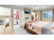 Main bedroom features an ensuite bathroom and a walk in closet at 18601 E Louisiana Ave, Aurora, CO 80017
