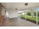 Spacious covered patio overlooking the green backyard and shed at 1077 Salem St, Aurora, CO 80011