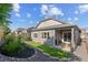Well maintained backyard with landscaping and a covered patio area for outdoor enjoyment at 10929 Endeavor Dr, Parker, CO 80134