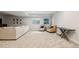 Basement living room featuring a comfortable sofa, chairs, and ample space for entertaining at 10929 Endeavor Dr, Parker, CO 80134