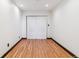 Bright room with hardwood floors and white doors with black trim at 40192 Margaret Dr, Elizabeth, CO 80107