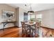 Inviting dining room featuring a wooden table set and stylish lighting fixture at 40192 Margaret Dr, Elizabeth, CO 80107