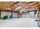 Large unfinished garage with insulated ceiling and work bench area at 40192 Margaret Dr, Elizabeth, CO 80107