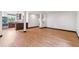 Open living space with hardwood floors, recessed lights, wood trim, and kitchen at 40192 Margaret Dr, Elizabeth, CO 80107