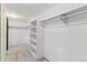 Spacious walk-in closet with white shelving and ample hanging space at 40192 Margaret Dr, Elizabeth, CO 80107