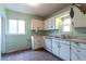 Functional kitchen with ample cabinet space at 1335 Locust St, Denver, CO 80220