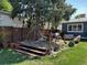 Backyard featuring deck with hammock and seating area at 4855 Knox Ct, Denver, CO 80221