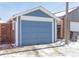 Detached garage with blue painted exterior at 4855 Knox Ct, Denver, CO 80221