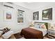 Cozy bedroom with a green velvet headboard at 2121 Hummingbird Way # 203, Georgetown, CO 80444