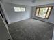Bedroom featuring plush carpeting, neutral paint, and a large window at 8947 Rutgers St, Westminster, CO 80031