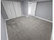 Spacious bedroom with neutral paint, plush carpeting, closet, and access to an attached bath at 8947 Rutgers St, Westminster, CO 80031