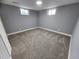 Bedroom featuring soft carpeting, neutral colored walls, a large window, and modern style at 8947 Rutgers St, Westminster, CO 80031
