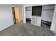 Bedroom with carpet and closet with built-in shelves and sliding doors at 8947 Rutgers St, Westminster, CO 80031