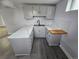 Kitchen featuring white countertops, updated cabinets, and modern fixtures at 8947 Rutgers St, Westminster, CO 80031