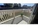 Cozy balcony with bright sunlight and an outdoor plant at 7695 E Quincy Ave # 207, Denver, CO 80237