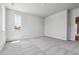 Large room with neutral carpet, a window and recessed lighting at 14145 Deertrack Ln, Parker, CO 80134