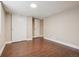 Basement bedroom featuring tiled floor, closet, and an entryway at 7650 W 24Th Ave, Lakewood, CO 80214