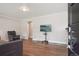 Cozy living room with hardwood floors, modern light fixtures, and comfortable seating at 7650 W 24Th Ave, Lakewood, CO 80214