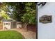 Well maintained yard with gravel area and extra storage shed, adding function and charm to the outdoor space at 7650 W 24Th Ave, Lakewood, CO 80214