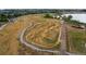 Aerial view of a park with mountain bike trails and a lake at 1867 W 137Th Ln, Broomfield, CO 80023