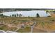 Aerial view of the community park with walking paths, play areas, and a picturesque lake at 1867 W 137Th Ln, Broomfield, CO 80023