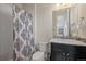 Bright bathroom featuring a shower, toilet, sink and vanity at 1867 W 137Th Ln, Broomfield, CO 80023
