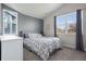 Comfortable bedroom with a queen-size bed and ample closet space at 1867 W 137Th Ln, Broomfield, CO 80023