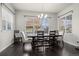 Bright dining room with hardwood floors and large windows at 1867 W 137Th Ln, Broomfield, CO 80023