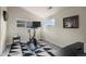 The exercise room features carpet, large windows and decor at 1867 W 137Th Ln, Broomfield, CO 80023