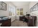 Bright home office with natural light, a desk, and ample storage space for a productive work environment at 1867 W 137Th Ln, Broomfield, CO 80023