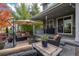 Spacious patio with fire pit, seating, and built-in grill at 1867 W 137Th Ln, Broomfield, CO 80023