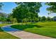 Curving concrete path through a grassy area at 1867 W 137Th Ln, Broomfield, CO 80023