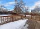 Wooden deck overlooking a spacious backyard at 10547 Pompey Way, Northglenn, CO 80234